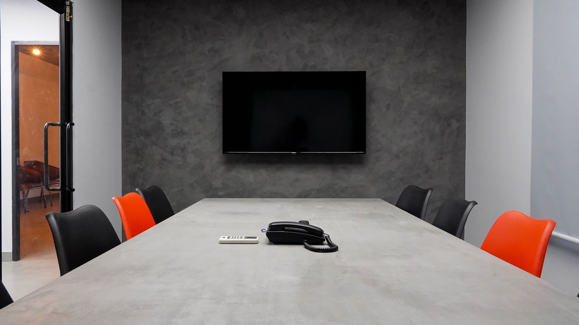 Commercial AV equipment installed in a modern office space